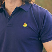 Model is wearing a Navy blue duck polo shirt
